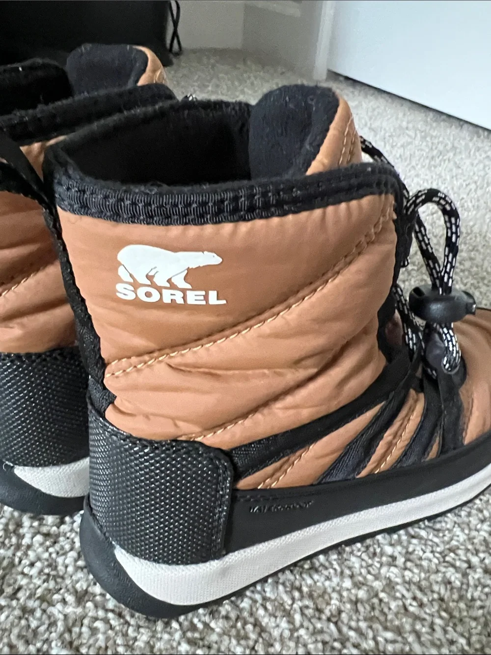 Sorel Tan and Black Insulated Winter Boots